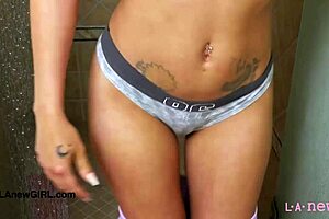 stunning brunette model takes a refreshing shower after photoshoot!