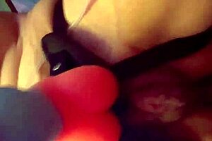 close-up self-exploration with dildo and toys in intimate setting