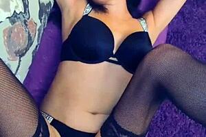 A private home video captures my wife in stockings.