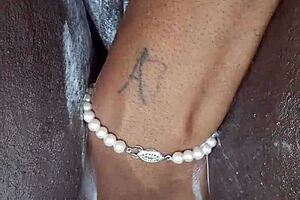 Black MILF shaves pussy on camera