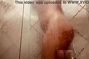 mature milf massages her huge clit and hairy pussy while filming in bathroom