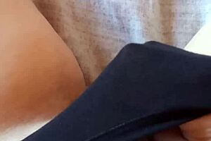 Gretala sensually poses in her black slip