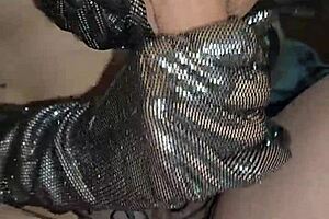 glove-wearing milf slowly milks a throbbing cock