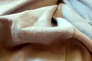 Does the amateur milf masturbate to orgasm in her bedroom pajamas?