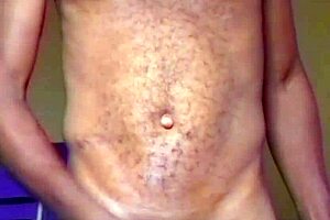 Lonely African man gropes himself after naked dance