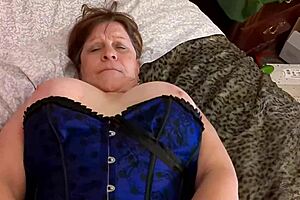 Granny Carmen Thrusts Vibrator to Intense Orgasm