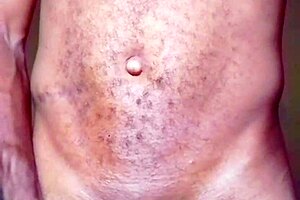 Lonely African man gropes himself after naked dance