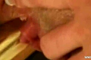 ebony woman masturbates her pussy with toys, feeling aroused and enjoying it