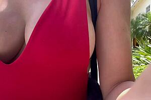 hot horny milf walks outdoor with big boobs on display