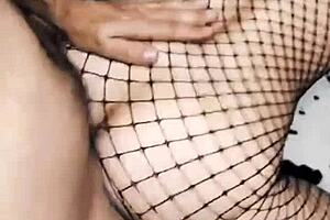wife cowgirl rides cock in erotic mesh bodysuit