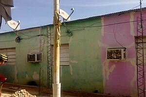 Neighbor watches mature latina's huge ass in short dress