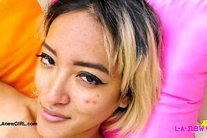 I love how this gorgeous asian model poses her sexy body on sofa for photoshoot