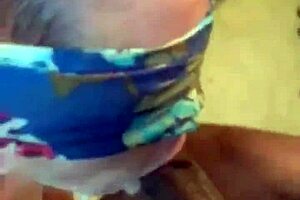 Blindfolded woman receives oral attention