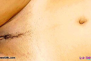 Captivating brunette model poses sexy in photoshoot