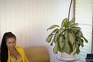 Hey, watch Kira Noir strip out of her business outfit 😍