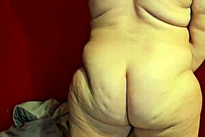 pregnant cougar in spread eagle position spreading ass