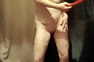 slave girl does striptease outdoors