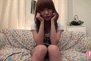 Pretty asian babe fingers herself to cum