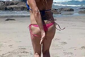 A milf goes nude in public outdoor setting