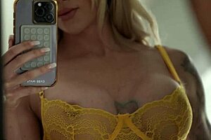 Pretty blonde milf changes into lingerie