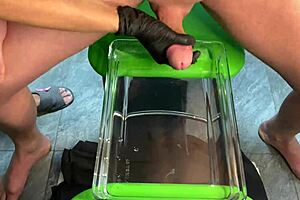 Mature MILF Gives Handjob Leading to Cumshot in Aquarium Setting