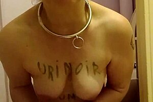 chained slave feels humiliation in public