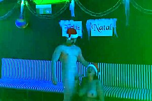 Christmas celebration with a fit milf and Saymon Fitness enjoying the holiday on red.