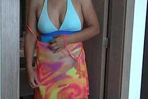 At the beach my stepmother shaves her pussy to put on a bikini and shows off.