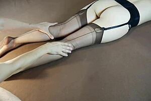 Horny MILF in stockings gets soles massaged until moaning with tickling fetish play. Feet worship builds to intense nylon-covered orgasm.