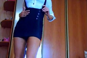 The beautiful cam girl wore a sexy skirt while performing her solo tease on webcam.