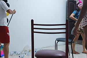 During work hours, the dedicated employees share a collaborative moment while thoroughly cleaning the entire office space together.