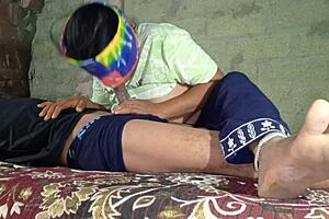 The young wife got a massage from her husband in the bedroom