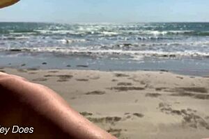 wife struts fully nude along the public beach showing off