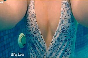 preview - wife swimming in the hotel pool in a hot one piece