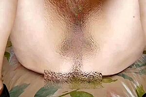 elderly granny with huge saggy tits explores her body in homemade solo session