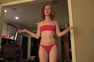 what's intriguing about this chica in a red bikini?