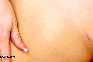 Beachy blonde babe reveals her sexy body during a photoshoot session with casting interview on the sofa.