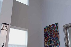 Blonde milf principal Sara Jay teases with her strap-on in lingerie while showing big ass and wet pussy lips.