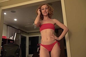 what's intriguing about this chica in a red bikini?