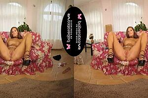 Jenifer Jane masturbates solo with a dildo in VR reality.