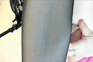 Milf with glasses masturbates using a vibrator