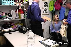 Two horny mall cops tag team a busty cougar in the back office after ripping her clothes.