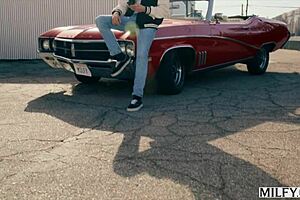 Milfy fit milf Justine gives deepthroat blowjob and licks balls to young stud. riding cowgirl squirting in classic car with fingering.