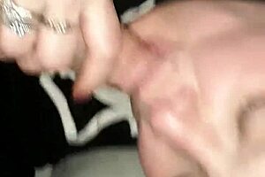 Brunette older woman kneels to suck Joshua Jisms massive BWC in Trick City, focusing on deepthroat techniques and swallowing every drop of cum from the big cock.