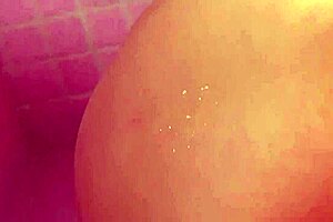 Shay and Julia explore each other's big tits with licks and fingering. They dive into lesbian pussy play using toys in stockings on the bed.