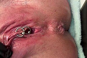 Pierced clit hard rubbing in latex gloves ends with hard stream pee solo