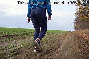 Milf with Nice Ass Teasing in Tight Yoga Pants and Thong from Behind