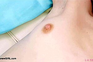 red haired model strips down on sofa during casting interview showing petite body