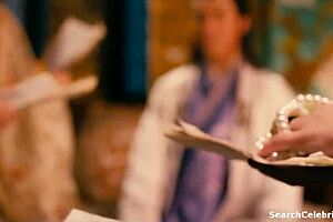 brunette milf with big tits gives blowjob and handjob to teen in sexy pornstar nude celebrity scene. they enjoy topless small tits action in 2011 film.