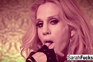 Sexy Sarah Jessie fingers her pussy in leather gloves